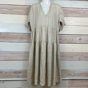 Cream color linen dress with contrasting green stitching